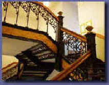 View of wroght iron double staircase in the Gasconade County Courthouse.